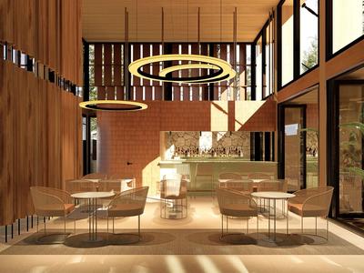 Modernes Hotelrestaurant mit Holzwänden, großen Fenstern und runden Deckenleuchten.