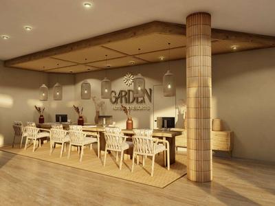 Salle à manger moderne avec des tables en bois, des chaises blanches et un éclairage chaleureux dans un restaurant.