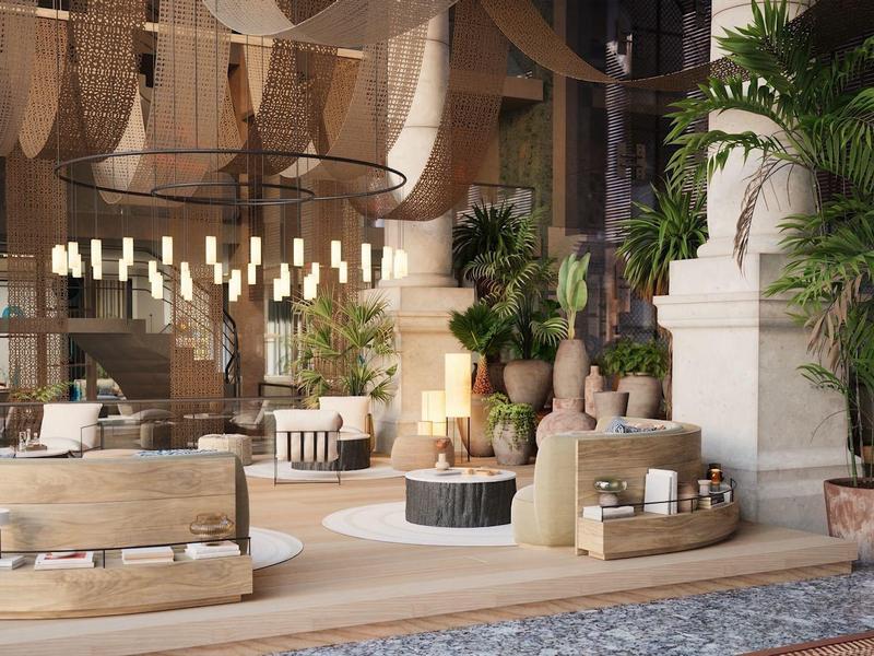 Elegancka recepcja hotelowa z ciepłym drewnem, roślinami i nowoczesnym oświetleniem.