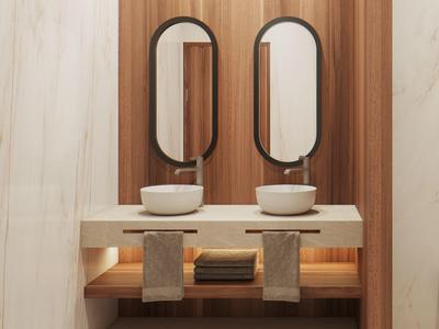 Nowoczesna łazienka z dwoma owalnymi lustrami, białymi umywalkami i drewnianymi akcentami.
