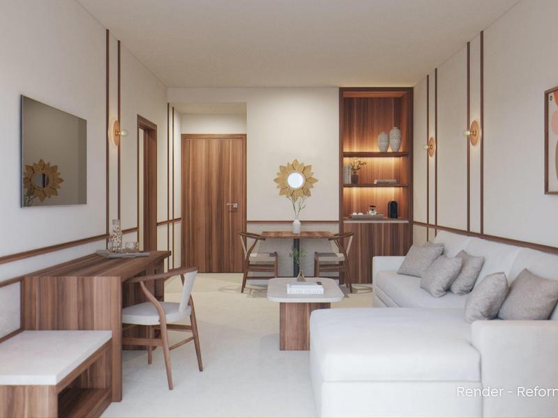 Nowoczesny salon z białą sofą i drewnianymi akcentami w pokoju hotelowym.