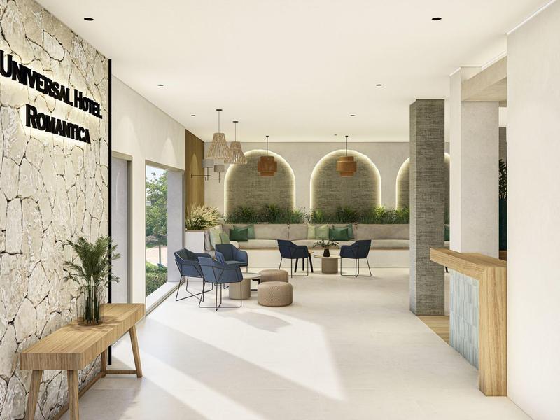 Jasna przestrzeń hotelowa z nowoczesnymi meblami i dużymi oknami