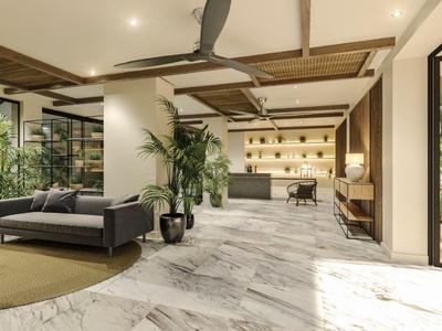 Lichte hotel lobby met marmeren vloer, groene planten en moderne zithoek