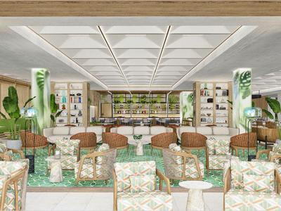 Hell eingerichtete Hotellounge mit grünen und beige Tönen, Pflanzen und gemütlichen Sesseln.