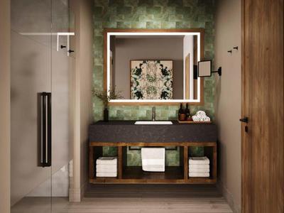 Moderne badkamer met verlichte spiegel, houten wastafel en glazen deur naar de douche.