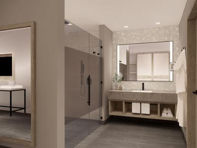 Nowoczesna łazienka z dużym lustrem, prysznicem, umywalką i ręcznikami.