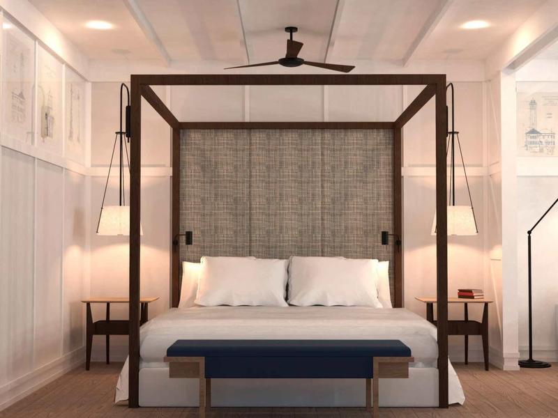 Modernes Schlafzimmer mit Himmelbett, grauem Kopfteil, zwei Nachttischen und warmem Licht.