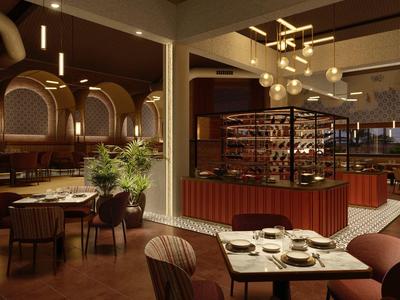 Elegantní restaurace s moderním osvětlením a stylovými posezeními.