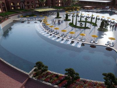 Großer Hotelpool mit Sonnenliegen und Palmen auf der Insel in der Mitte.