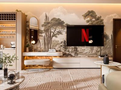 Gemütliches Hotelzimmer mit modernem TV, Holzmöbeln und natürlicher Wanddekoration.