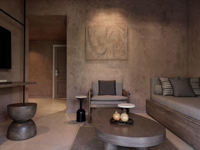 Sala moderna con paredes de cemento, sofá minimalista y mesa de centro con decoración.