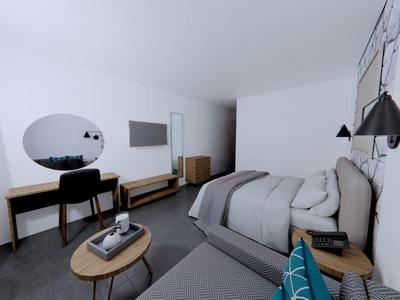 Modern eingerichtetes Hotelzimmer mit zwei Betten, Schreibtisch und Fernseher.