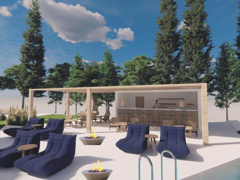 Moderne Terrasse mit blauen Sitzmöbeln und Pergola im Freien unter blauem Himmel.