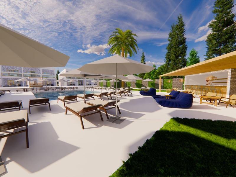 Moderner Außenbereich mit Lounge-Möbeln, Sonnenschirmen und Blick auf einen Pool in einer Hotelanlage.