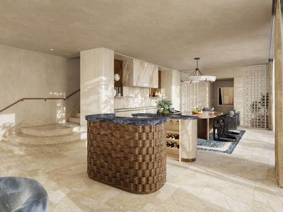 Espace de vie ouvert moderne avec cuisine et table à manger dans des tons chauds.