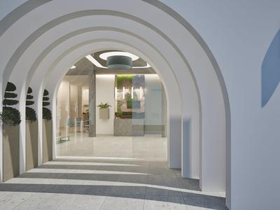 Corridoio moderno dell'hotel con archi architettonici bianchi e grande facciata in vetro sullo sfondo