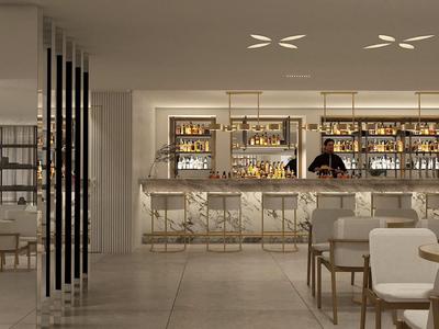 Nowoczesny bar hotelowy z eleganckim barem i siedzeniami w neutralnych kolorach.