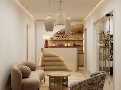 Modernes, gemütliches Hotelinterieur mit hellen Wänden, Sofas und Designelementen in warmen Tönen.