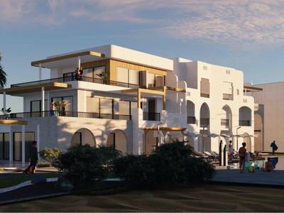 Modernes Hotelgebäude mit weißen Fassaden und großen Balkonen unter blauem Himmel.