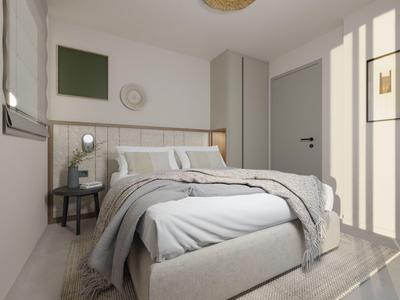 Dormitorio luminoso y moderno con una cama grande y decoración minimalista.