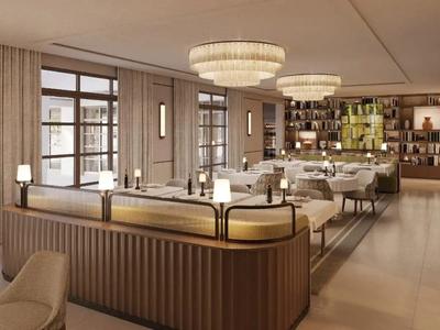 Eleganter Hotel-Loungebereich mit gemütlichen Sitzgruppen und stilvoller Beleuchtung.