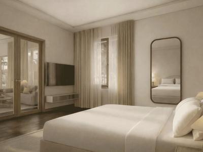 Modernes Hotelzimmer mit großem Bett, Wandspiegel und Fernseher neben Glas-Schiebetüren.