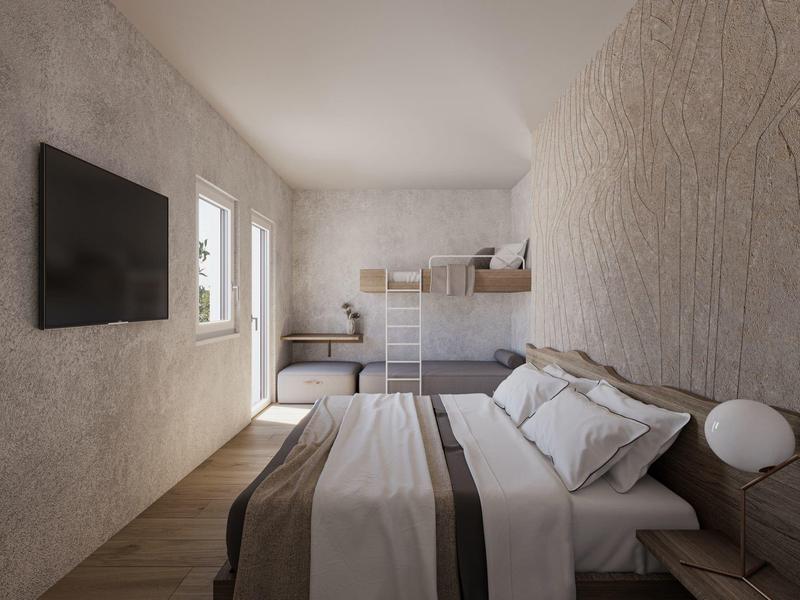 Chambre lumineuse avec lit double, lits superposés et télévision murale au style moderne.