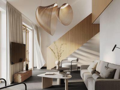 Soggiorno moderno con divano, tavolino e scala in una stanza luminosa