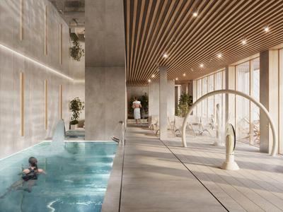 Piscina interna moderna con soffitto in legno e grande finestra con vista sul giardino.