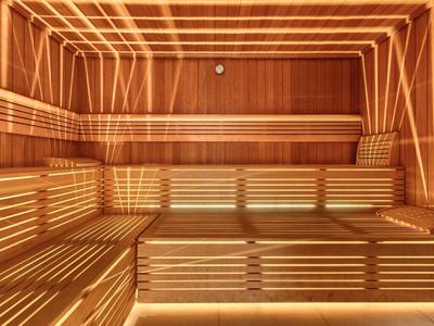 Moderne Sauna mit Holzverkleidung und indirekter Beleuchtung