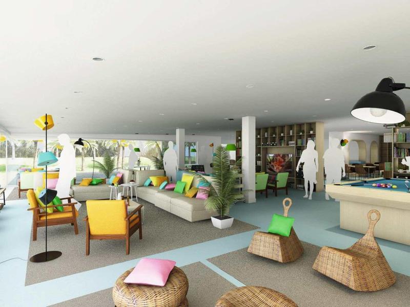 Heller, moderner Gemeinschaftsraum mit Sitzkissen, Tischen, Pflanzen und großer Fensterfront.