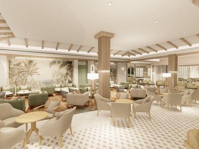 Jasna, luksusowa restauracja hotelowa z wygodnymi fotelami i eleganckim wystrojem.