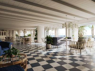 Przestronny, otwarty salon z czarno-białą podłogą w kratę i nowoczesnymi meblami oraz dużą ilością światła dziennego.