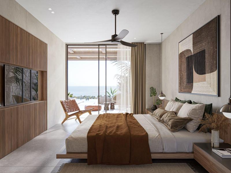 Nowoczesna sypialnia z dużymi oknami, drewnianymi meblami i widokiem na morze.