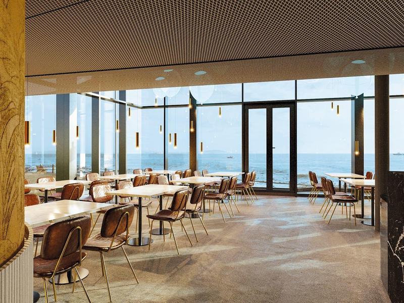Modern restaurant with wood and leather furniture overlooking the sea through large windows.