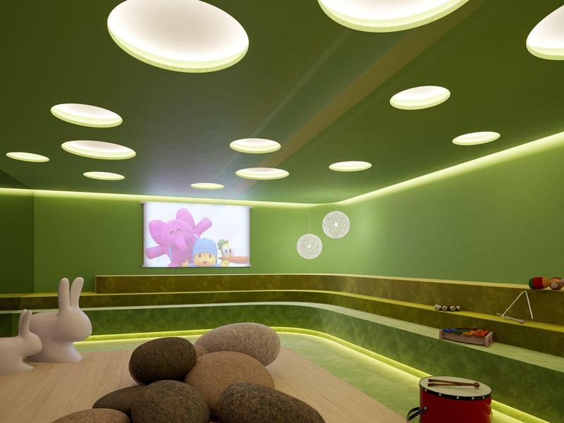 Salle de bien-être moderne lumineuse avec lumières rondes et sièges confortables.
