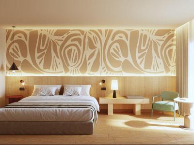 Modern hotel room with large bed, light wood accents, and floor-to-ceiling windows.