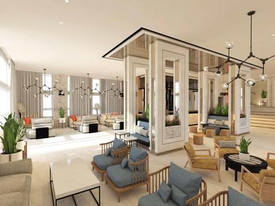 Heller, moderner Hotel-Loungebereich mit bequemen Sesseln, Sofas und großen Fenstern.