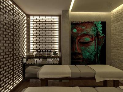 Sala benessere moderna con due lettini da massaggio e parete illuminata.