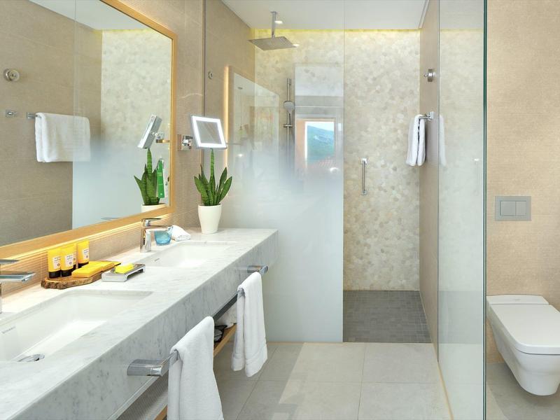 Moderne badkamer met grote glazen douche, dubbele wastafels en toilet in lichte stijl.