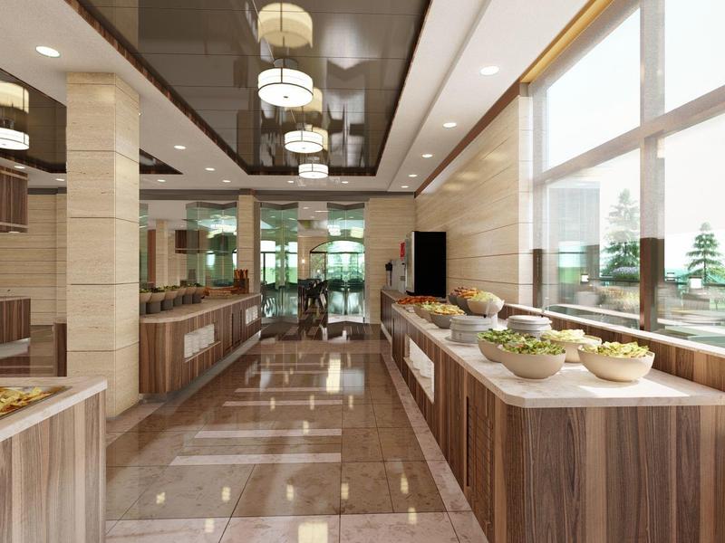 Modern gestaltete Kantine mit großen Fenstern, Holzmöbeln und hellen Deckenleuchten.