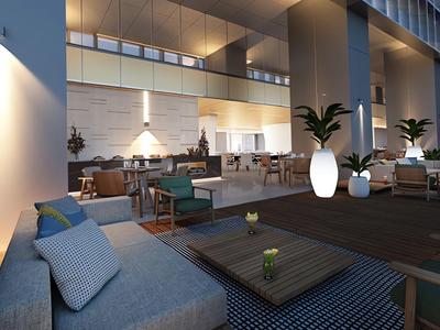 Modern outdoor lounge with cozy seating and stylish lighting at a hotel.