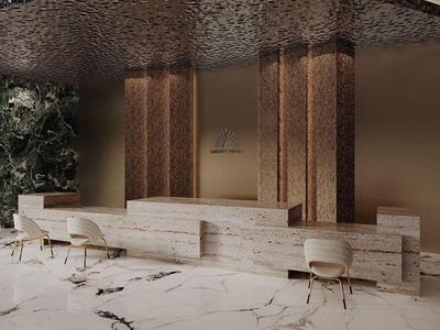 Modern hotel reception area with a long stone desk and marble-patterned floor