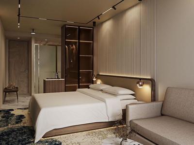 Modern hotel room with double bed, sofa, and open wardrobe.