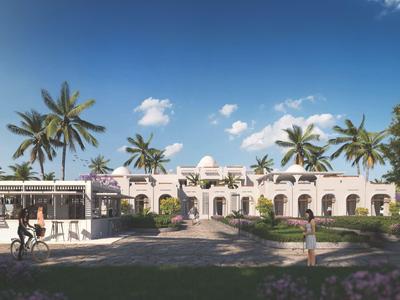 Bright hotel building with palm trees and clear blue sky in the background