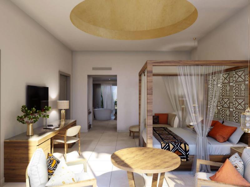 Nowoczesny pokój hotelowy z łóżkiem z baldachimem, drewnianymi meblami i przytulnym miejscem do siedzenia pod okrągłym otworem w suficie.