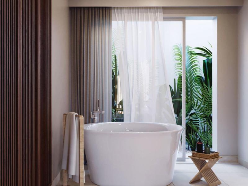 Nowoczesna łazienka spa z wolnostojącą wanną, drewnianymi panelami i roślinami.