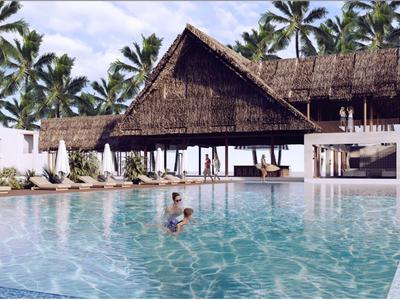 Grande piscina con palme e padiglione aperto in un resort tropicale