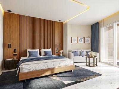 Modernes Schlafzimmer mit Holzwand, großem Bett, Sofa und Zugang zu einem Balkon.